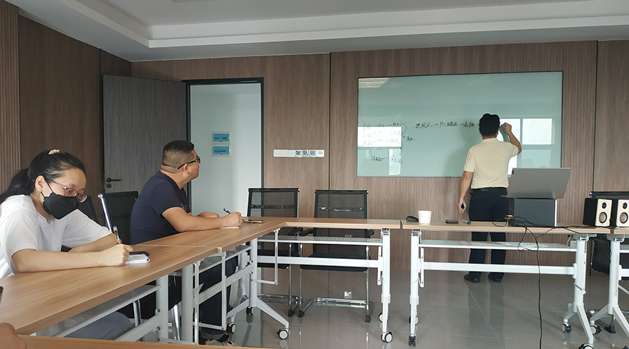 金環(huán)電器組織員工進(jìn)行滾筒干衣機知識理論培訓(xùn)